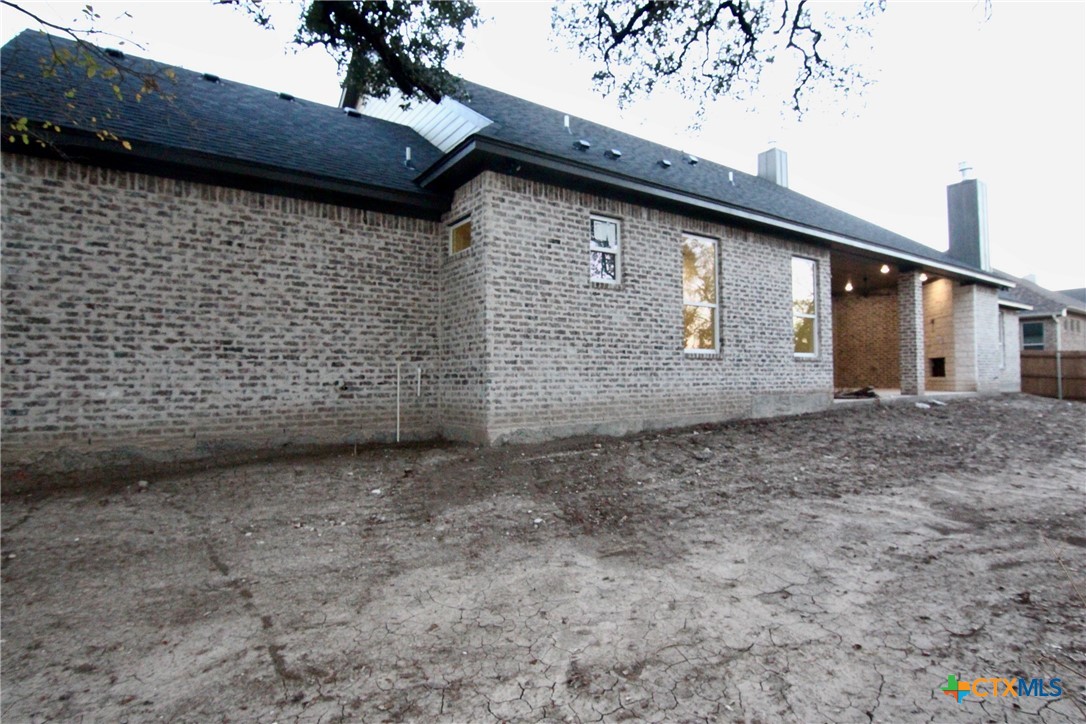 5809 Whippoorwill Road Temple, TX 76502 - Photo 4 of 5 a backyard of a house