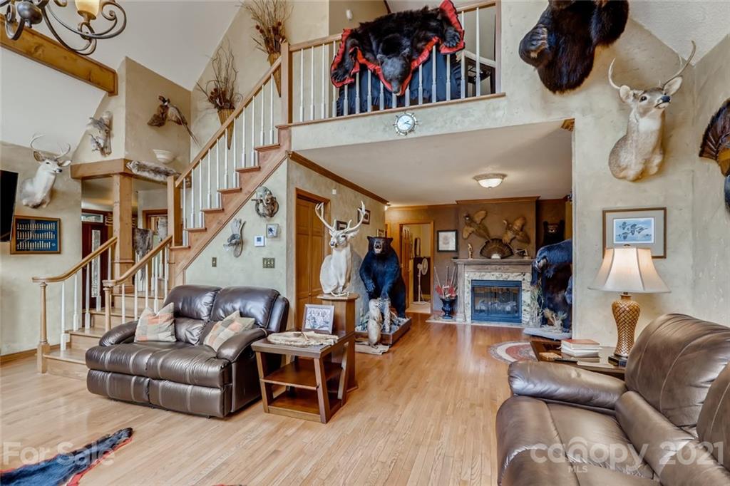 5508 Griffith Road Monroe, NC 28112 - Photo 14 of 48 a living room with furniture and wooden floor