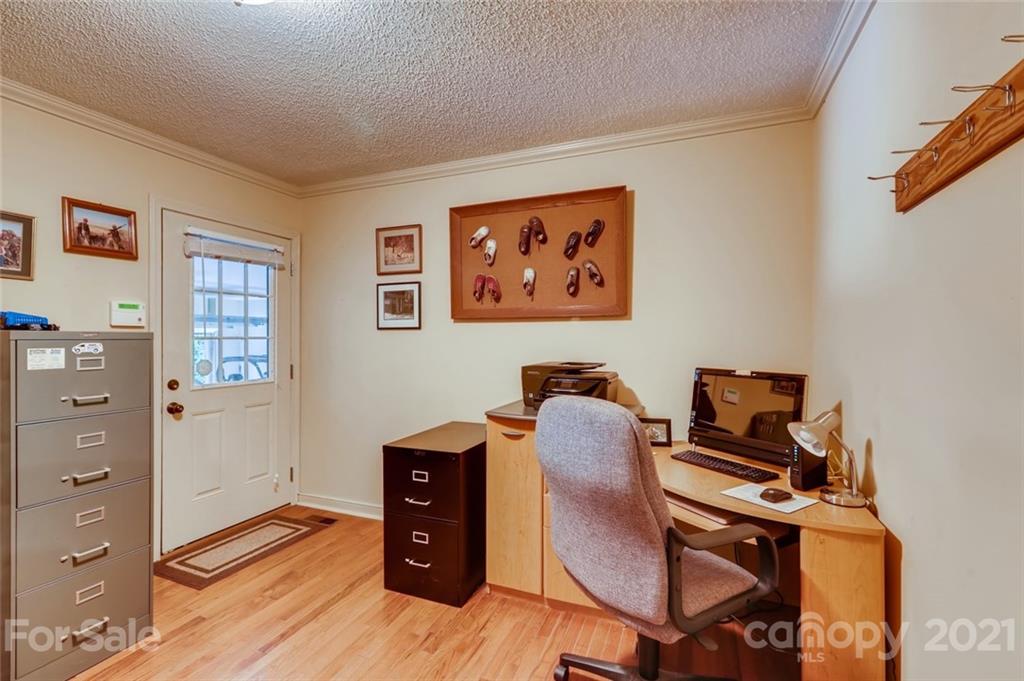 5508 Griffith Road Monroe, NC 28112 - Photo 27 of 48 a view of workspace with wooden floor