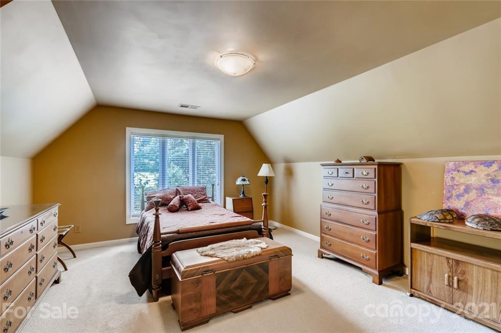5508 Griffith Road Monroe, NC 28112 - Photo 31 of 48 a bedroom with furniture and a large window