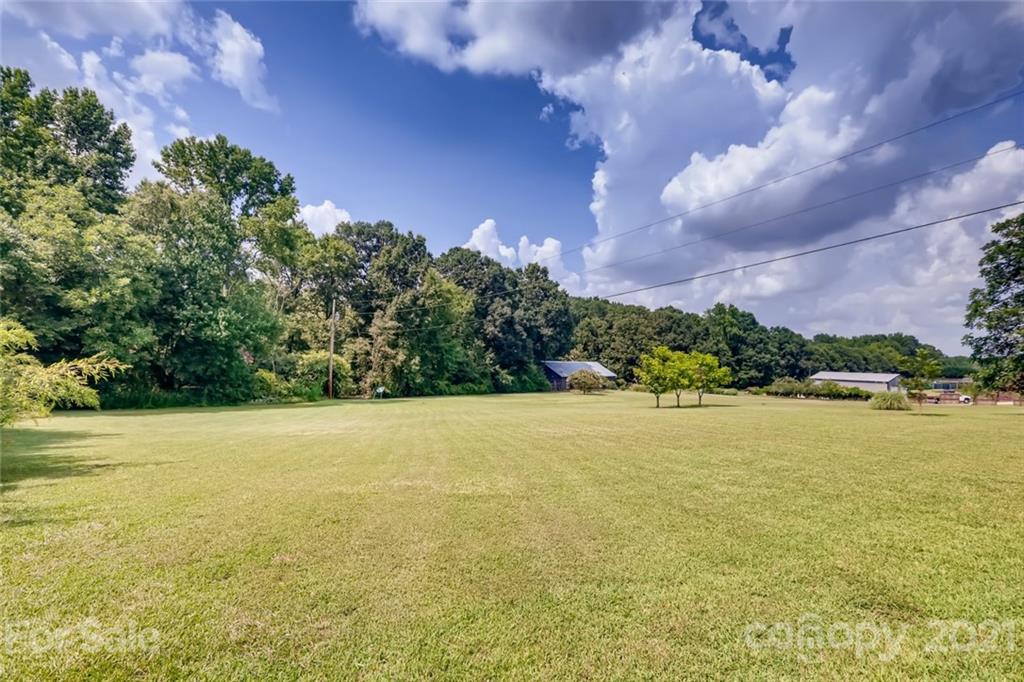 5508 Griffith Road Monroe, NC 28112 - Photo 40 of 48 a view of an ocean and a mountain