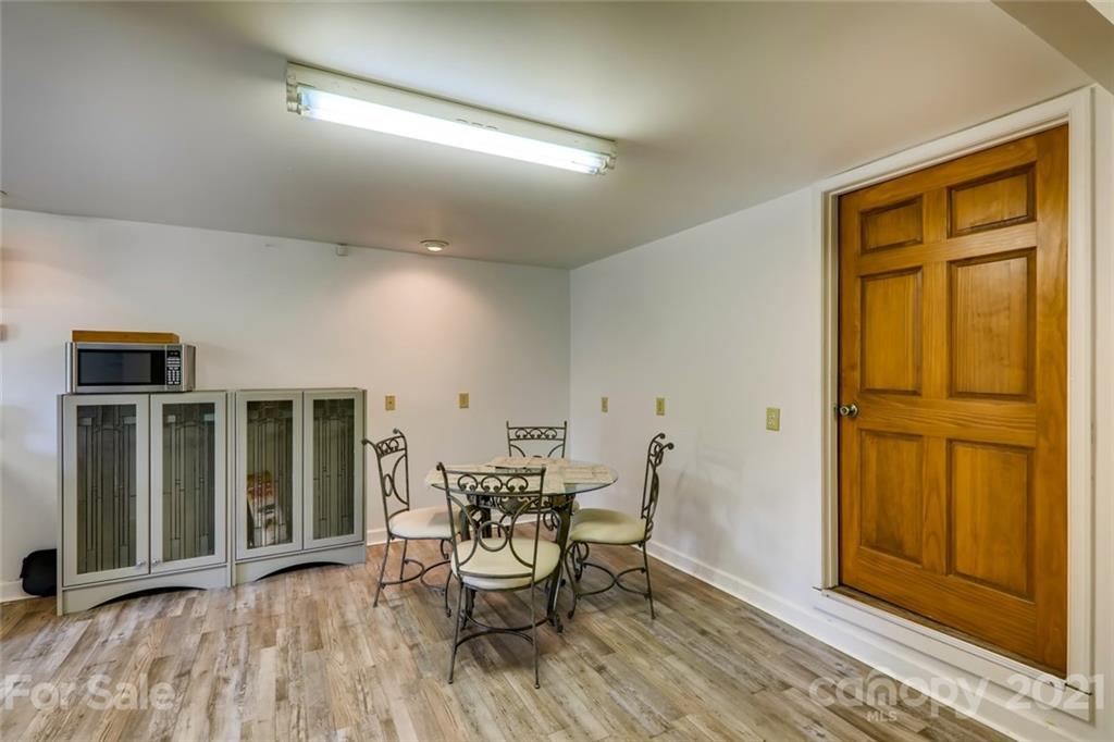 5508 Griffith Road Monroe, NC 28112 - Photo 46 of 48 a view of a dining room with furniture and window