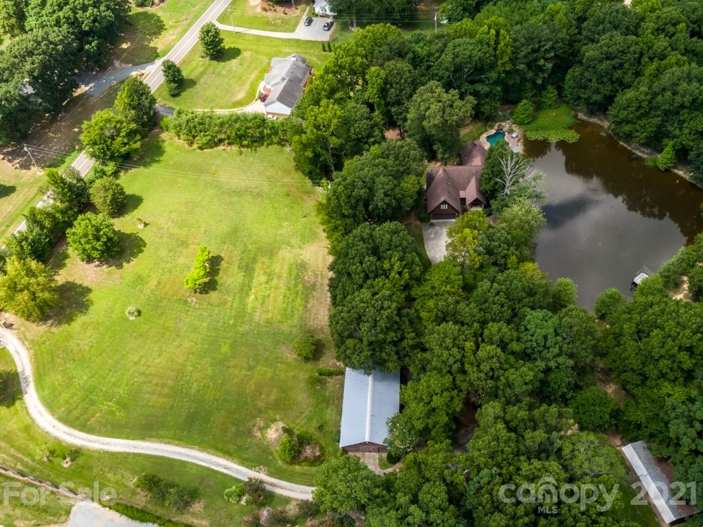 5508 Griffith Road Monroe, NC 28112 - Photo 6 of 48 an aerial view of residential house with outdoor space and trees all around
