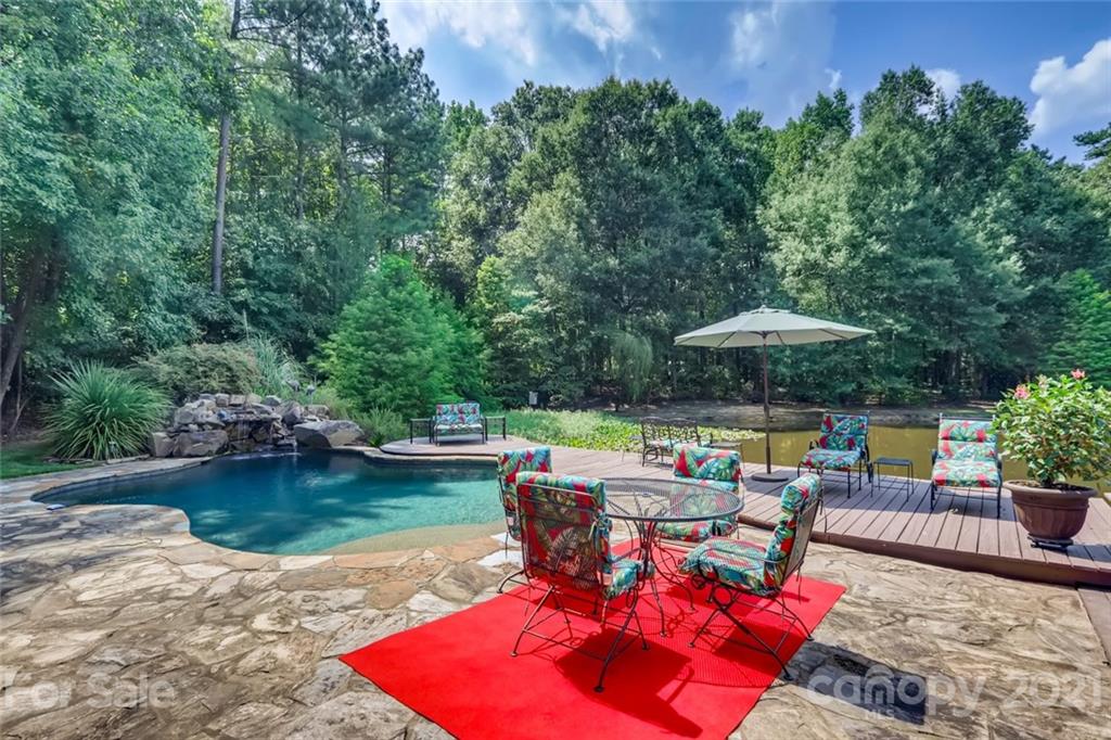 5508 Griffith Road Monroe, NC 28112 - Photo 9 of 48 swimming pool view with a seating space