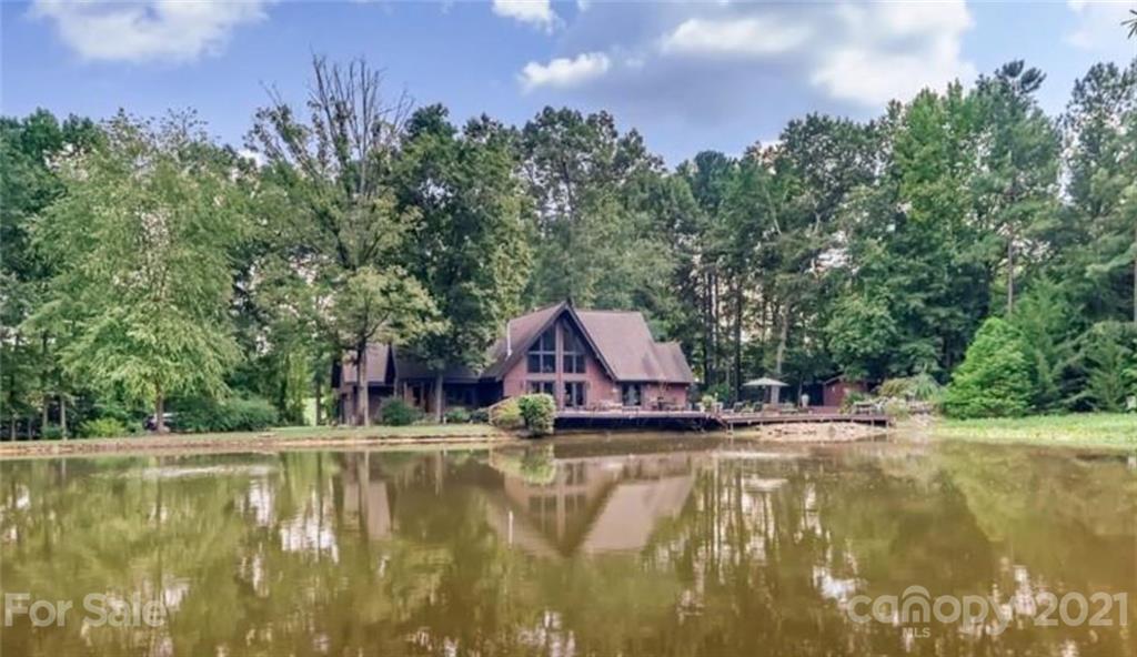 5508 Griffith Road Monroe, NC 28112 - Photo 10 of 48 a view of swimming pool with a yard