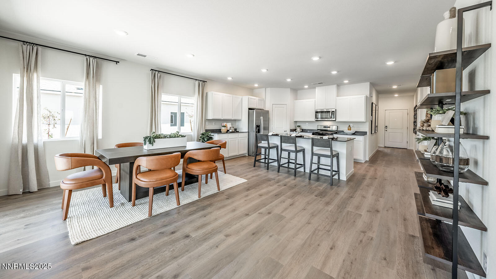 4536 Mifflin Street, Unit LOT #5 Fernley, NV 89408 - Photo 13 of 25 a view of a dining room with furniture and wooden floor