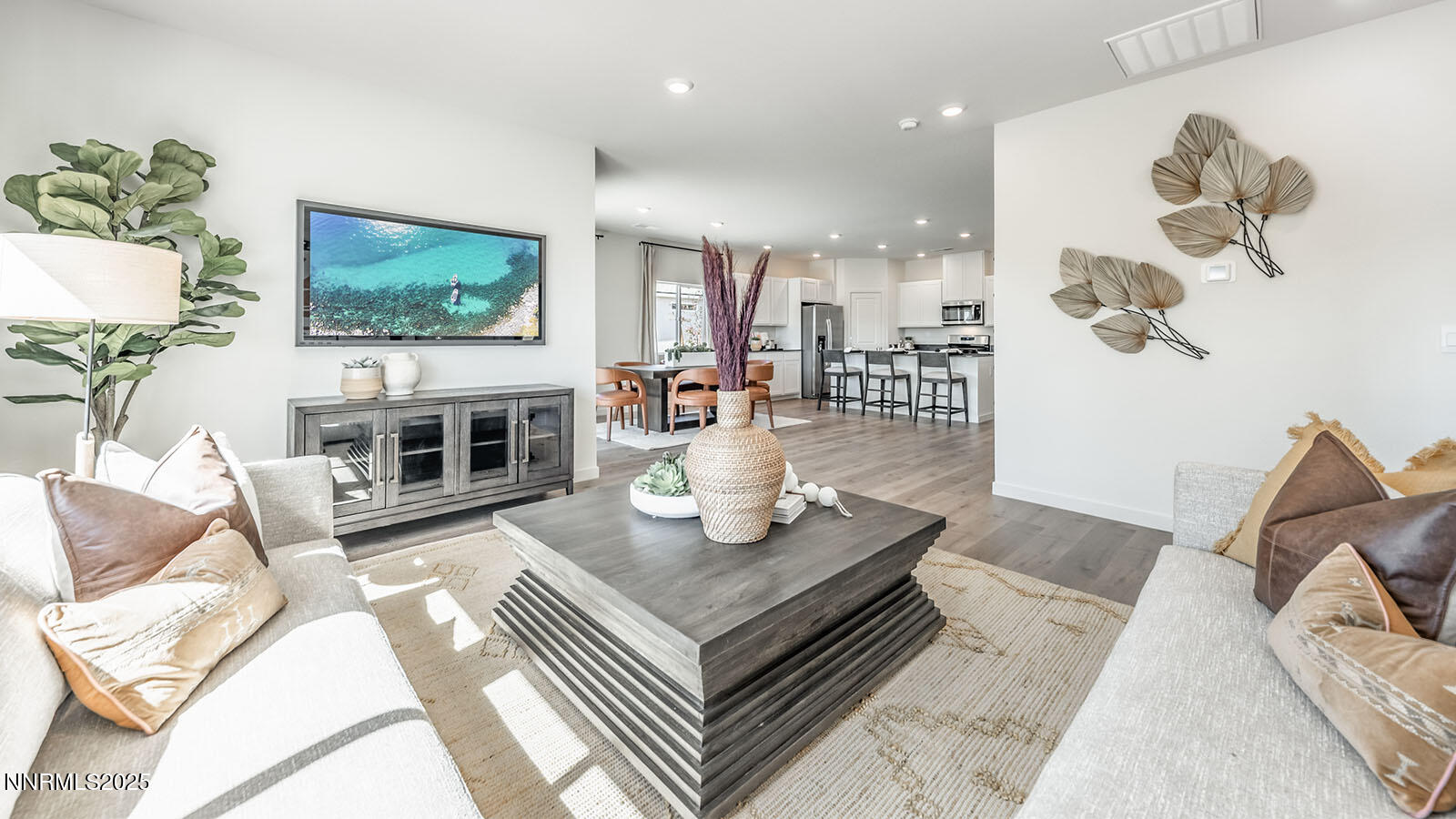 4536 Mifflin Street, Unit LOT #5 Fernley, NV 89408 - Photo 16 of 25 a living room with fireplace furniture and a flat screen tv