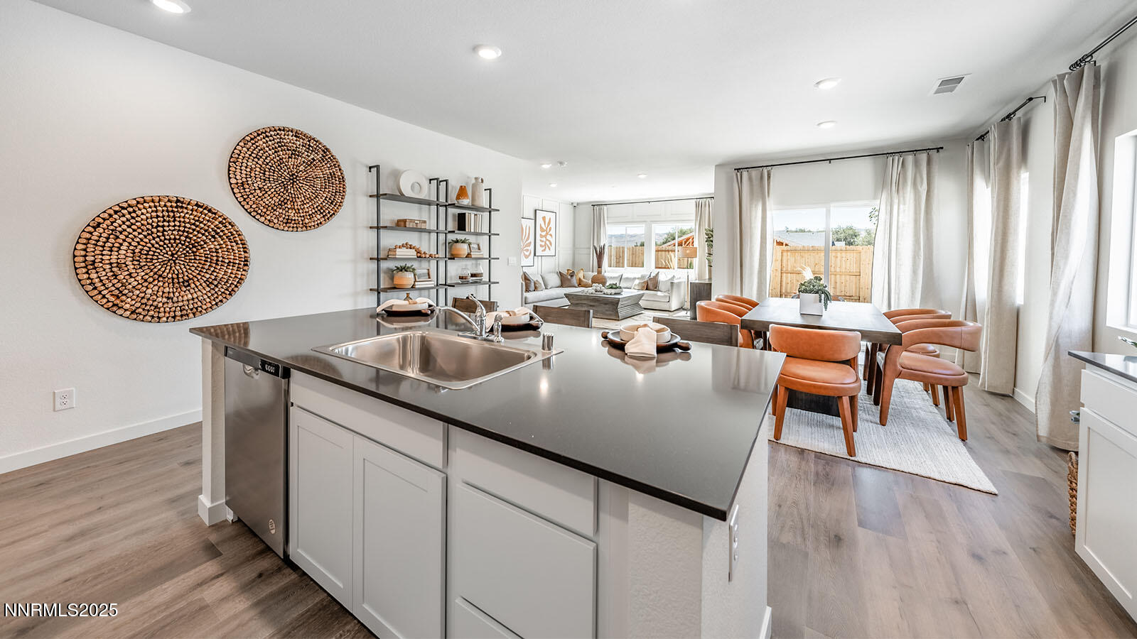 4536 Mifflin Street, Unit LOT #5 Fernley, NV 89408 - Photo 8 of 25 a view of a kitchen area with furniture and wooden floor