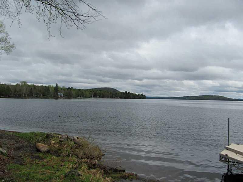 156 W Road Portage, ME 04768 - Photo 4 of 13 Exterior Front. Welcome to the Lake!