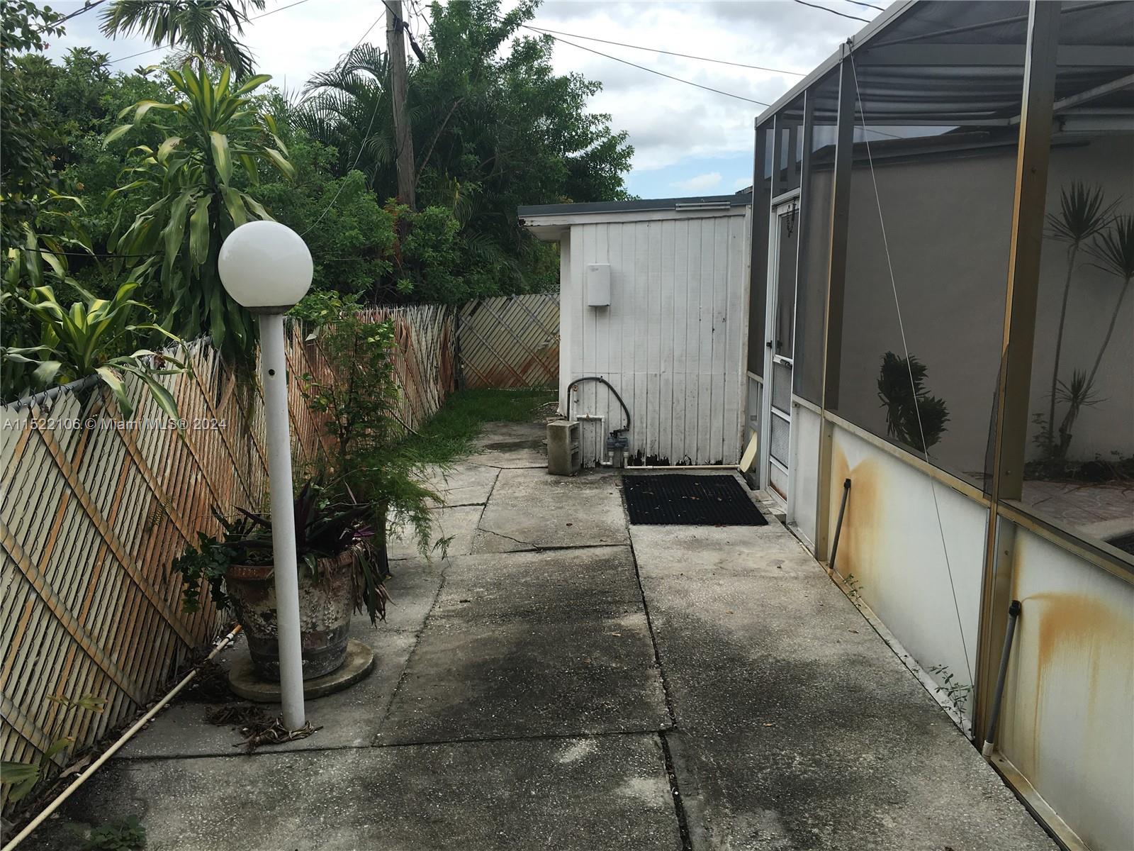 6737 Azalea Drive Miramar, FL 33023 - Photo 16 of 18 a view of a porch