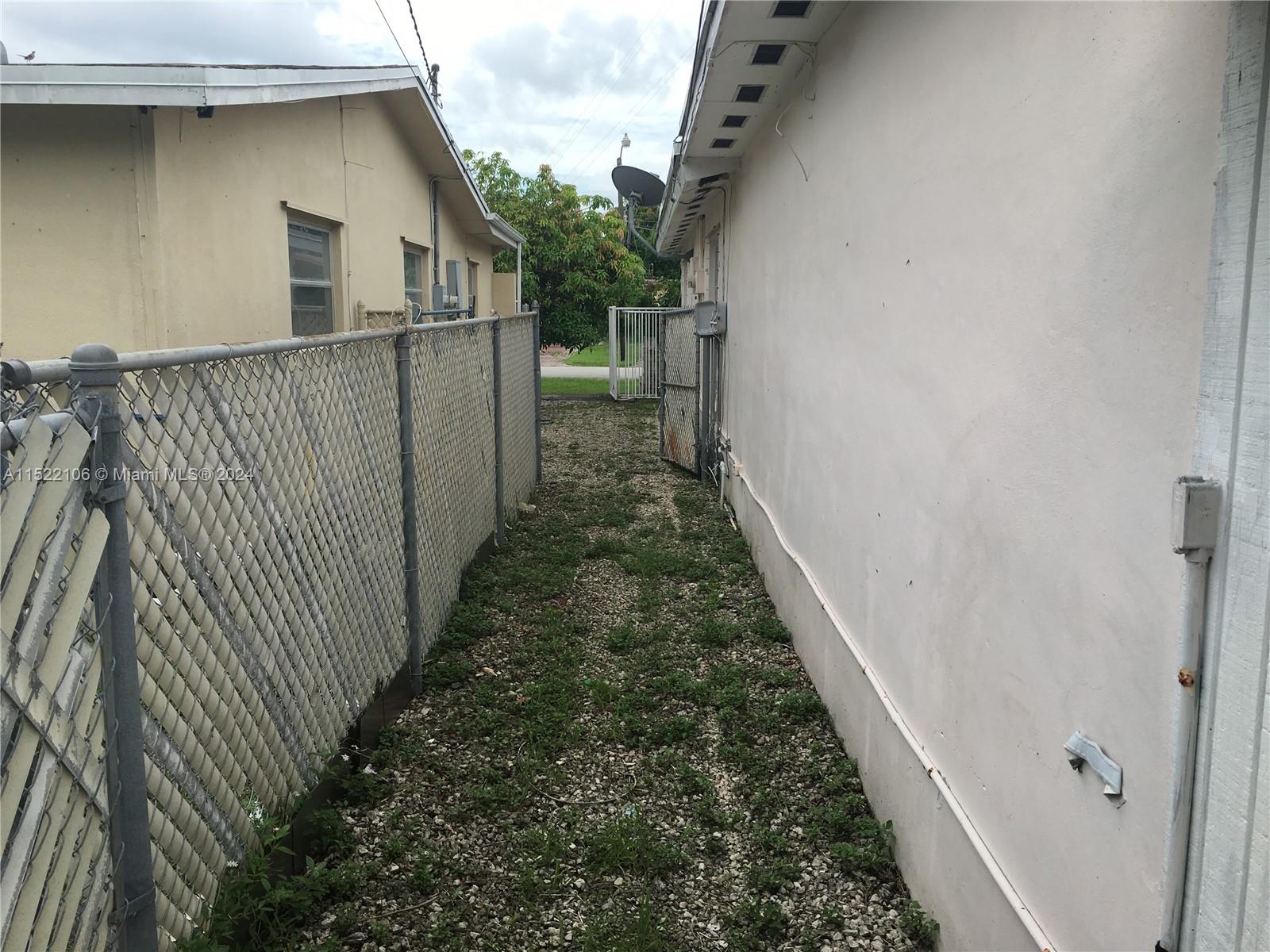 6737 Azalea Drive Miramar, FL 33023 - Photo 17 of 18 a view of a backyard
