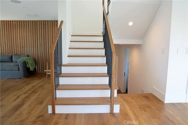 a view of entryway with wooden floor