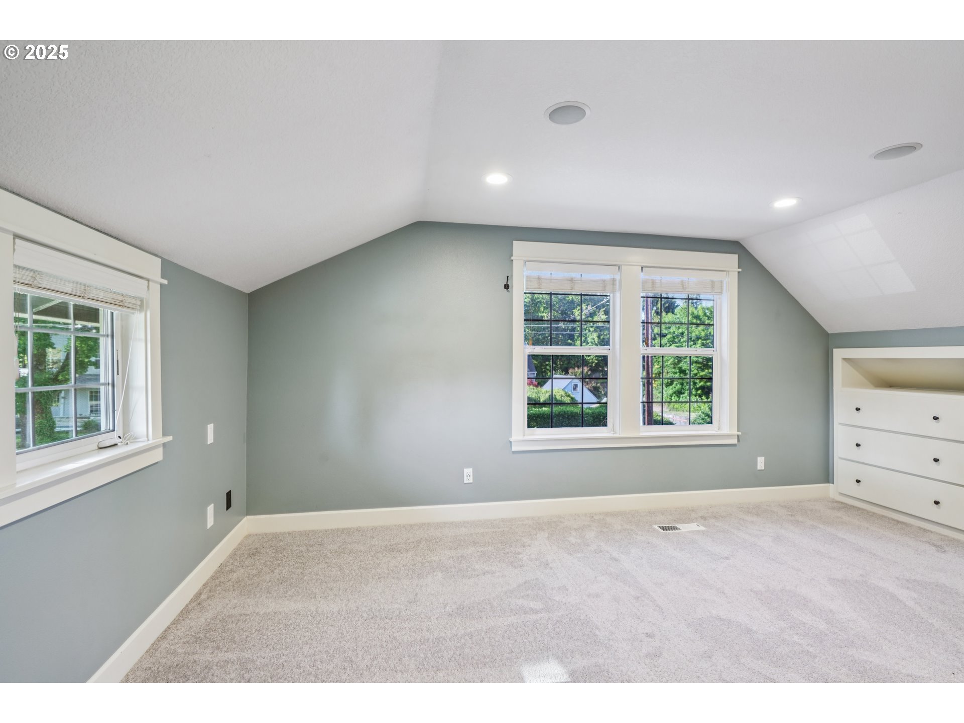 303 Maple Street Ridgefield, WA 98642 - Photo 20 of 36 a room with a window and a dresser