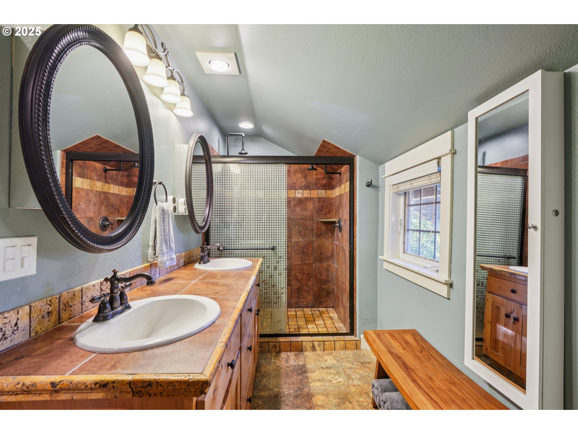 303 Maple Street Ridgefield, WA 98642 - Photo 21 of 36 a bathroom with a sink and a mirror