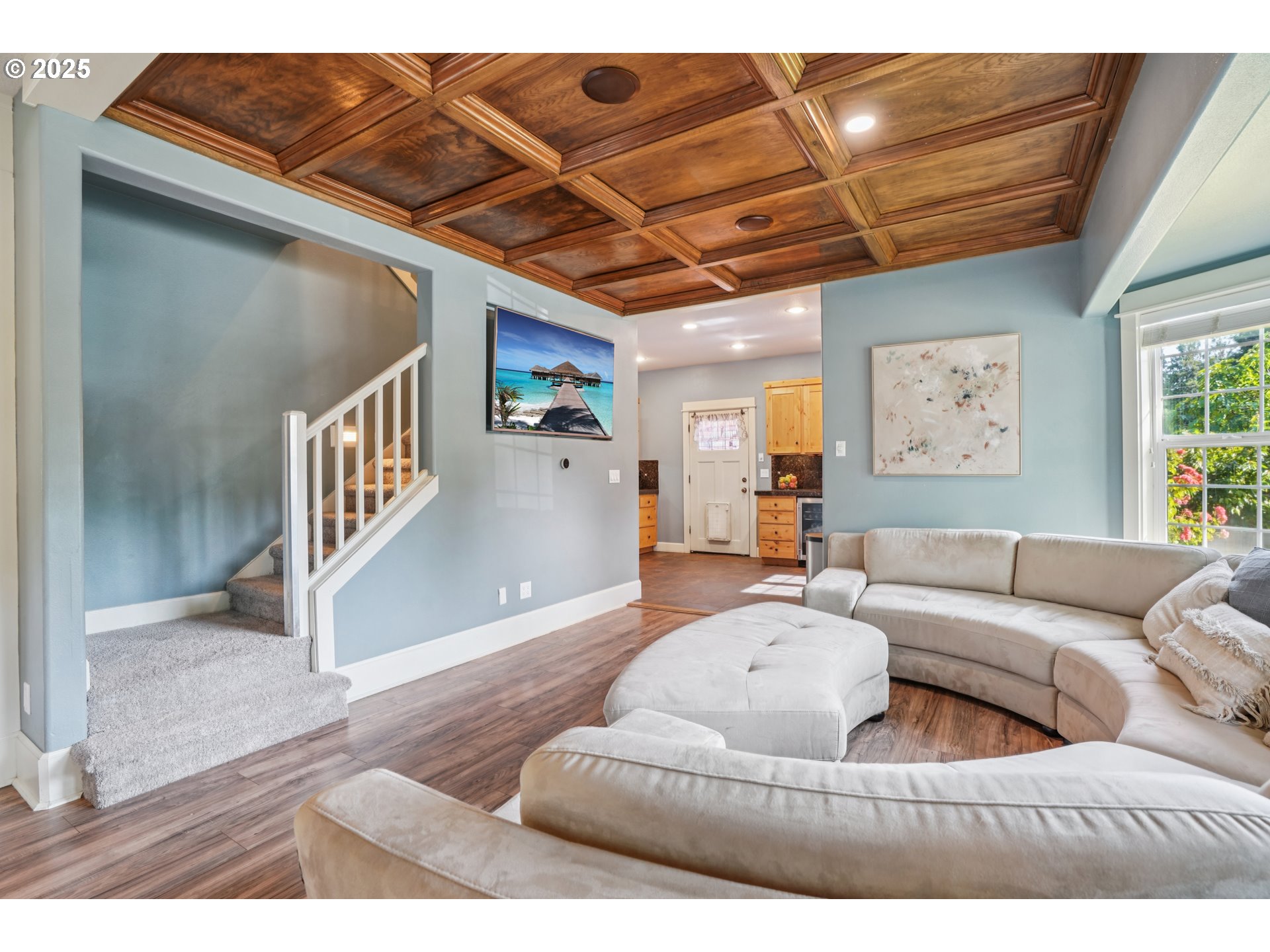 303 Maple Street Ridgefield, WA 98642 - Photo 8 of 36 a living room with furniture and a large window