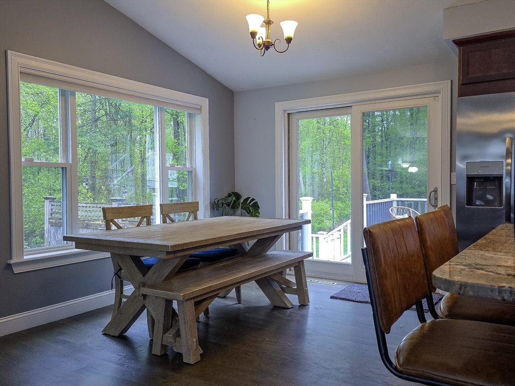 357 Ledge Road Seekonk, MA 02771 - Photo 14 of 42 a view of a dining room with furniture window and outside view