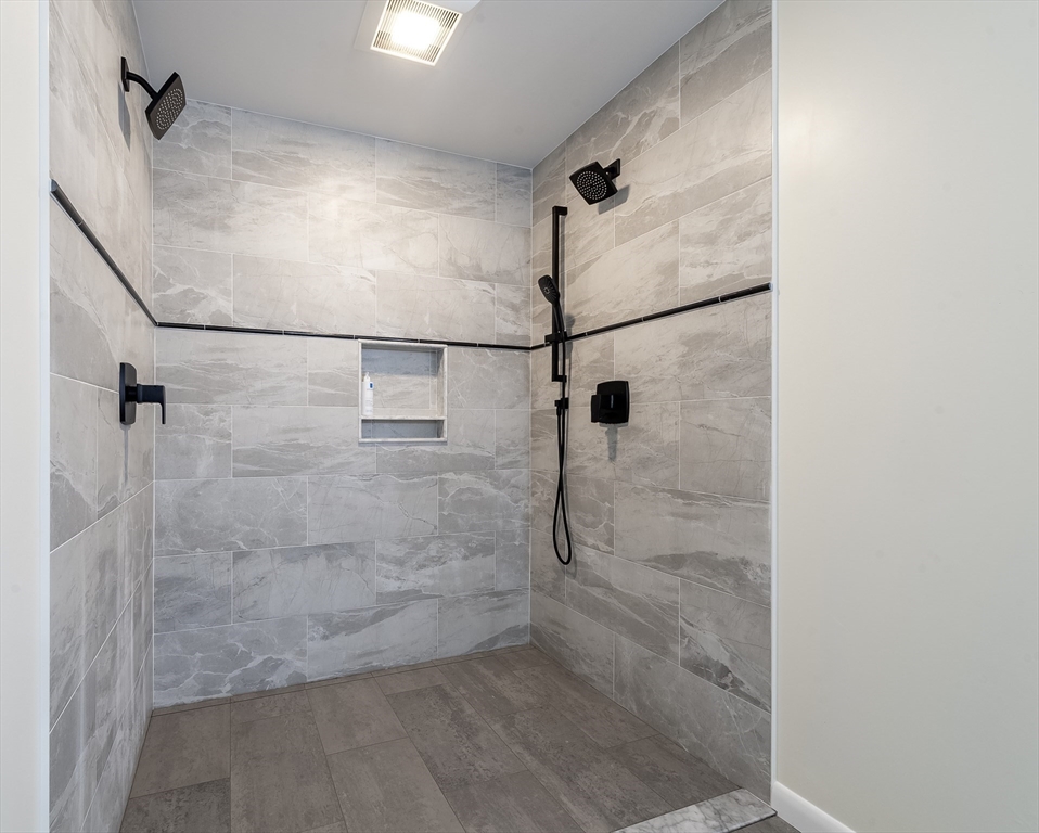 357 Ledge Road Seekonk, MA 02771 - Photo 28 of 42 a bathroom with a shower