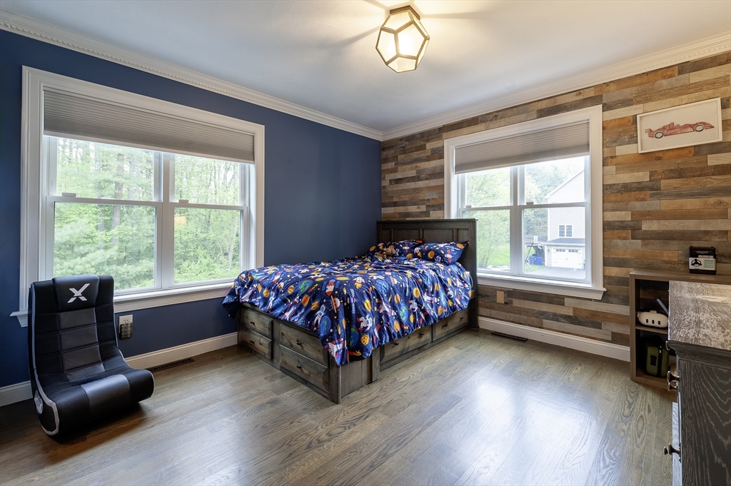 357 Ledge Road Seekonk, MA 02771 - Photo 29 of 42 a bedroom with a bed and a large window