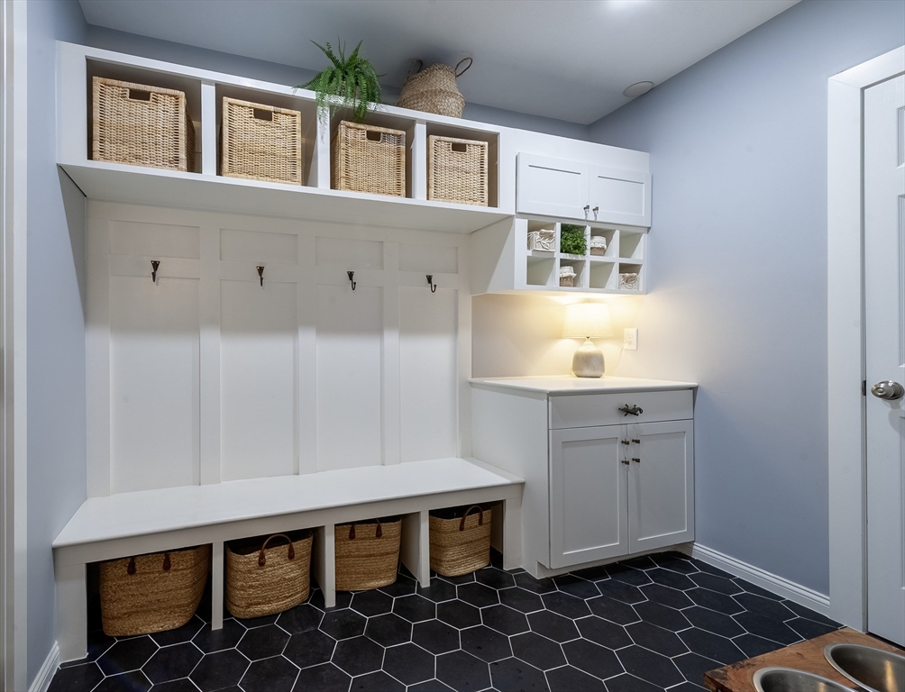 357 Ledge Road Seekonk, MA 02771 - Photo 34 of 42 a view of kitchen with granite countertop white cabinets and window