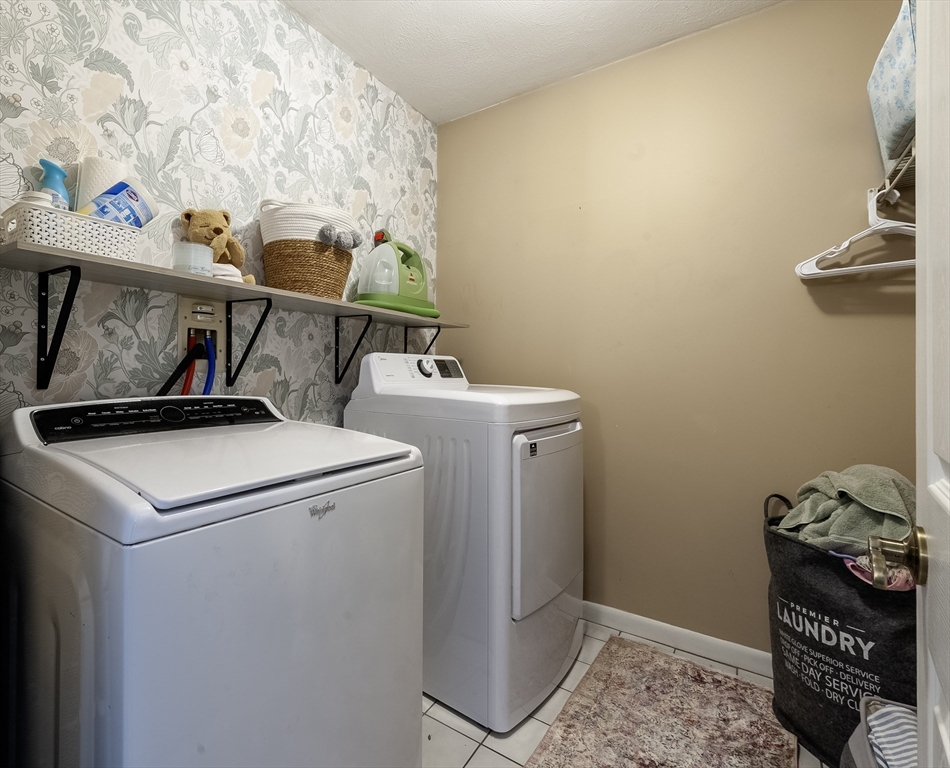 357 Ledge Road Seekonk, MA 02771 - Photo 35 of 42 a utility room with dryer and washer