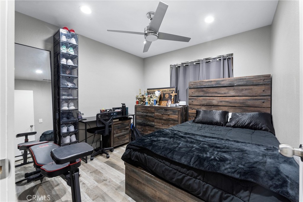4254 Manx Court Riverside, CA 92503 - Photo 21 of 38 a living room with furniture and wooden floor