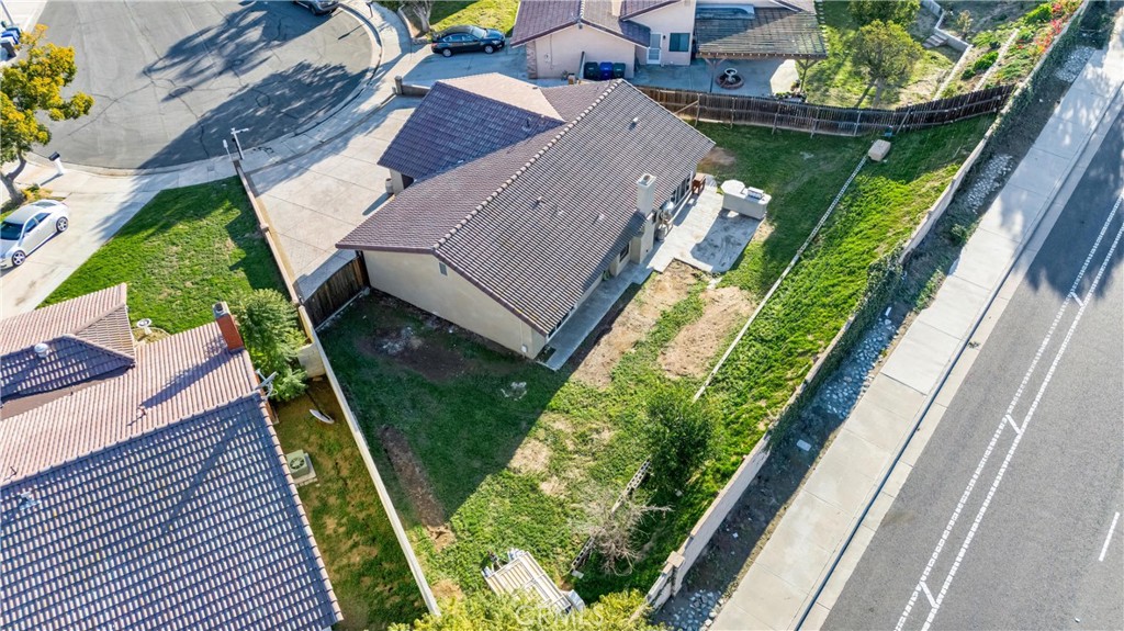 4254 Manx Court Riverside, CA 92503 - Photo 31 of 38 an aerial view of a house with a garden and plants