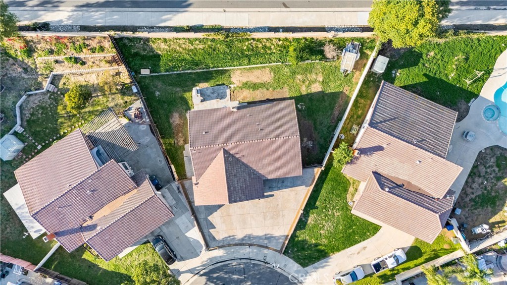 4254 Manx Court Riverside, CA 92503 - Photo 32 of 38 an aerial view of a house with a yard and balcony