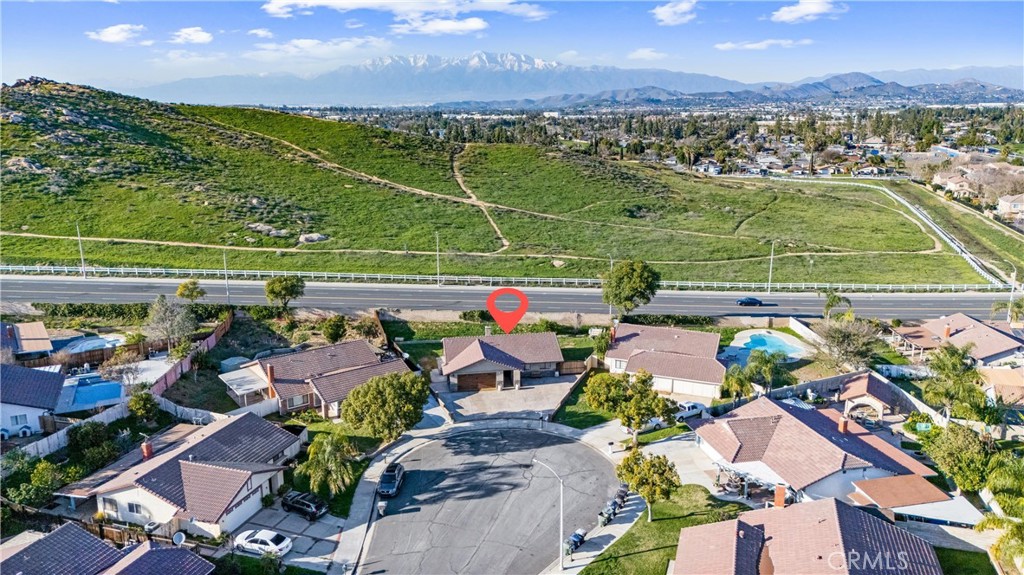 4254 Manx Court Riverside, CA 92503 - Photo 33 of 38 an aerial view of residential houses with outdoor space and a lake view