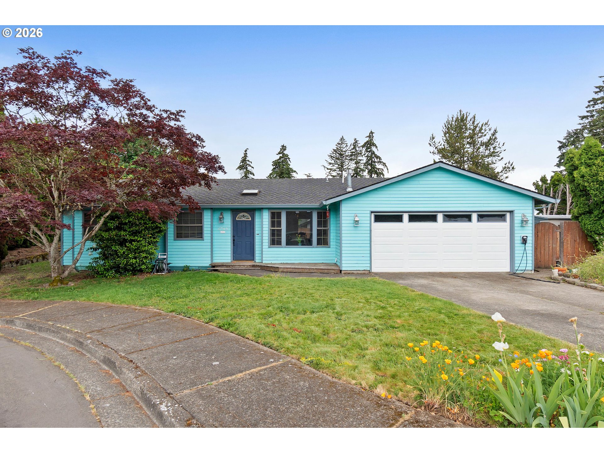 6749 Southwest 174th Place Beaverton, OR 97007 - Photo 1 of 39 a front view of a house with a yard and garage