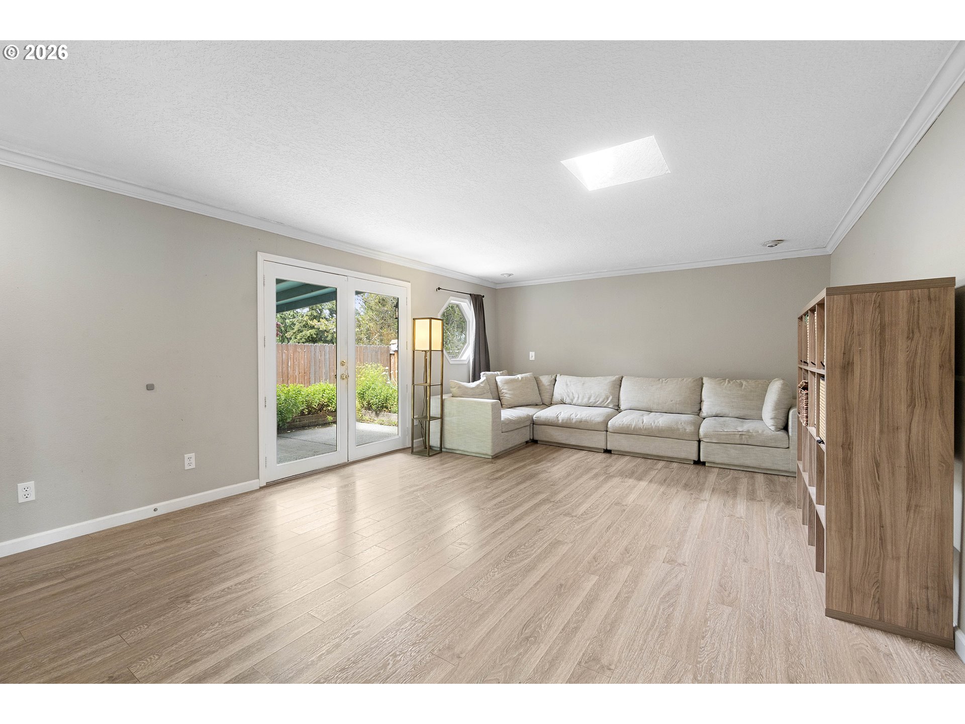 6749 Southwest 174th Place Beaverton, OR 97007 - Photo 18 of 39 a living room with furniture and a large window