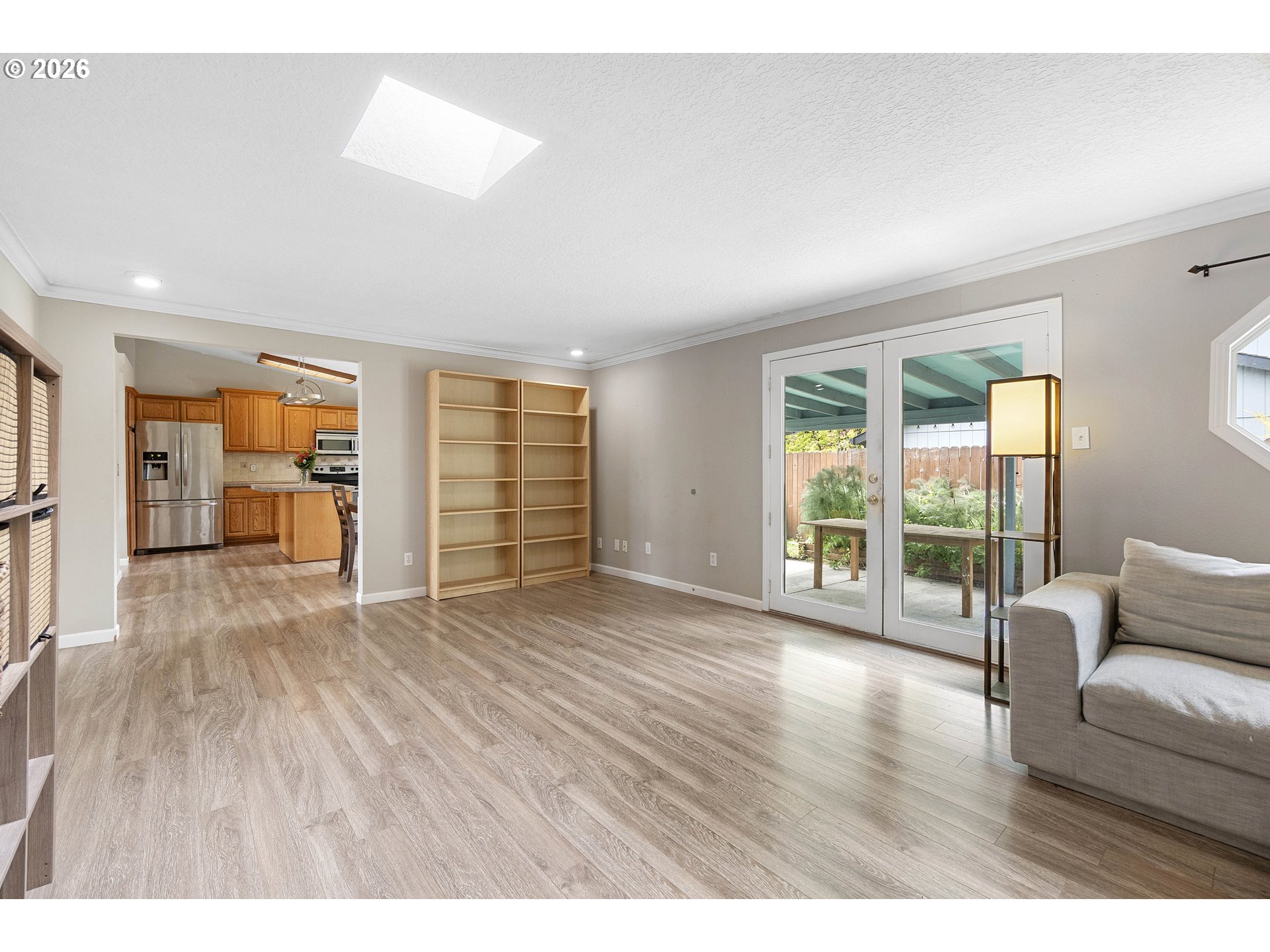 6749 Southwest 174th Place Beaverton, OR 97007 - Photo 21 of 39 a view of an empty room with wooden floor and a window