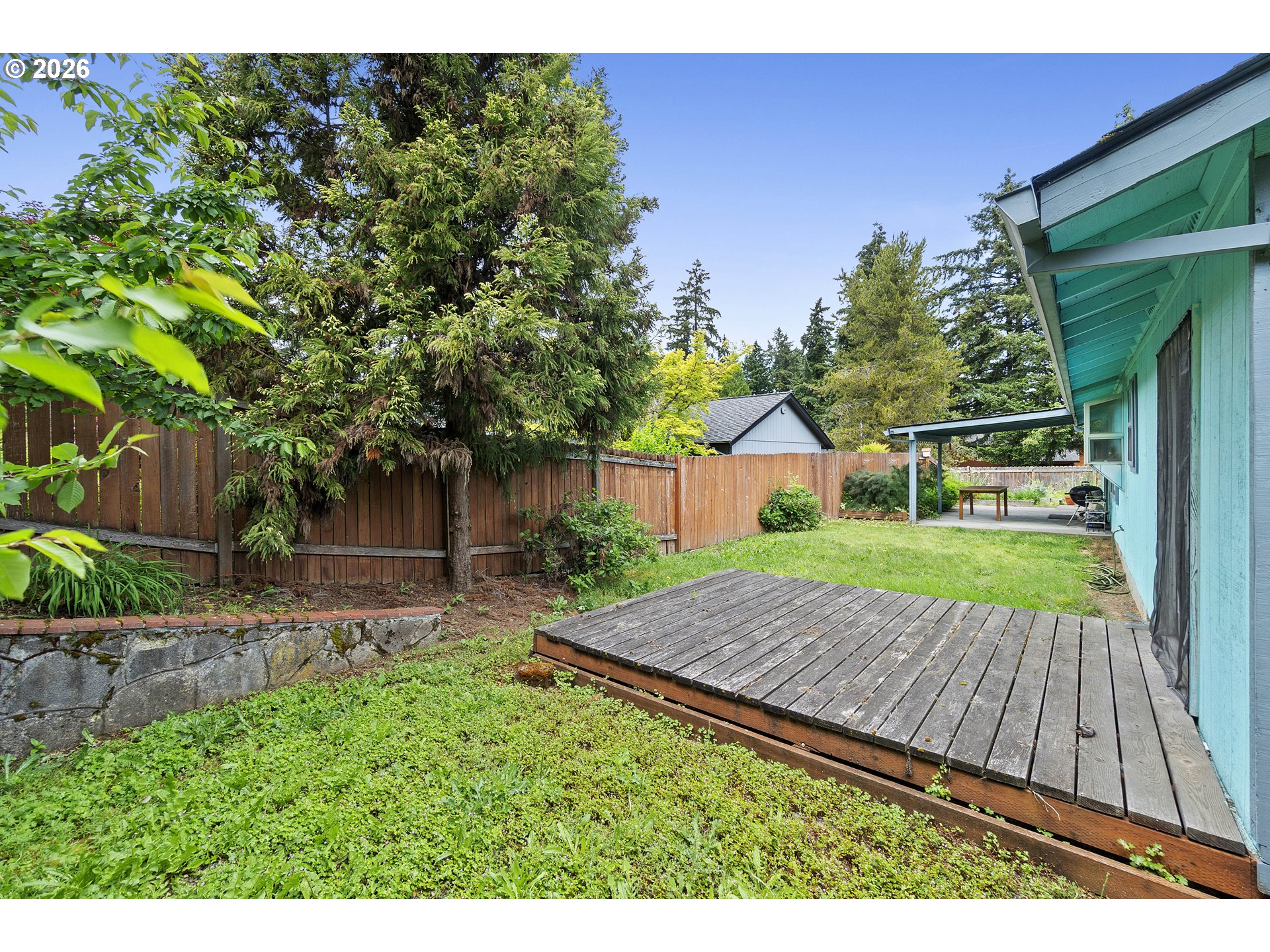 6749 Southwest 174th Place Beaverton, OR 97007 - Photo 36 of 39 a view of backyard with wooden floor