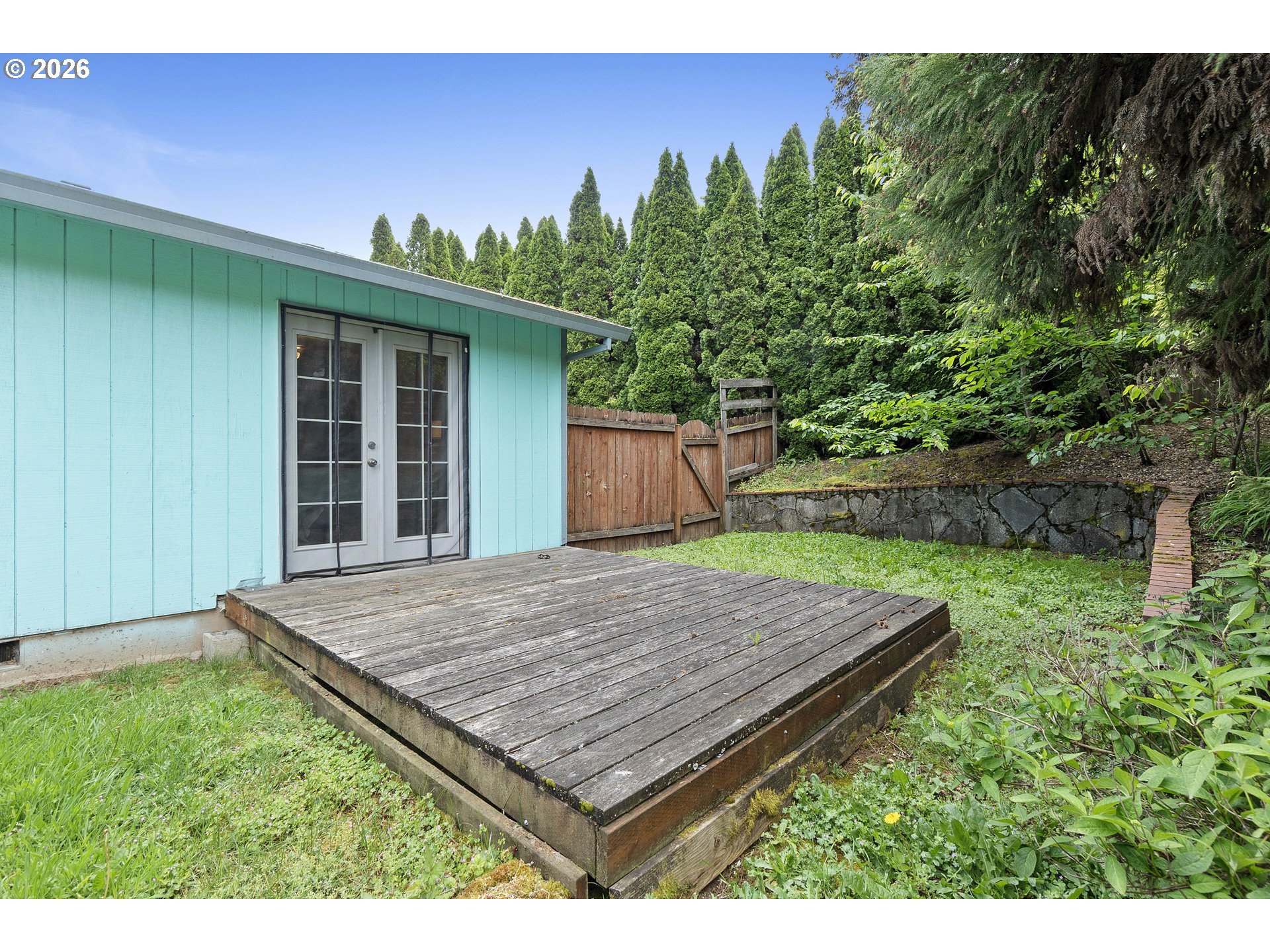 6749 Southwest 174th Place Beaverton, OR 97007 - Photo 37 of 39 a wooden floor with a outdoor space