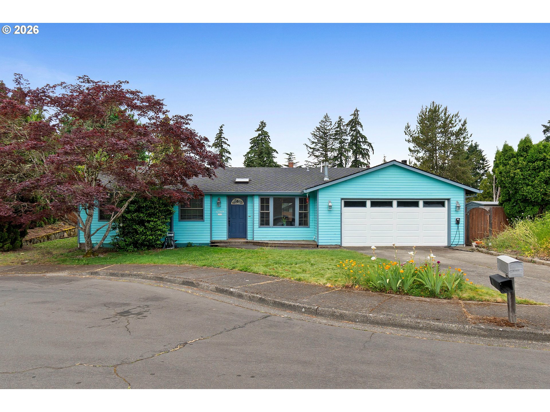 6749 Southwest 174th Place Beaverton, OR 97007 - Photo 39 of 39 a front view of a house with a yard and garage