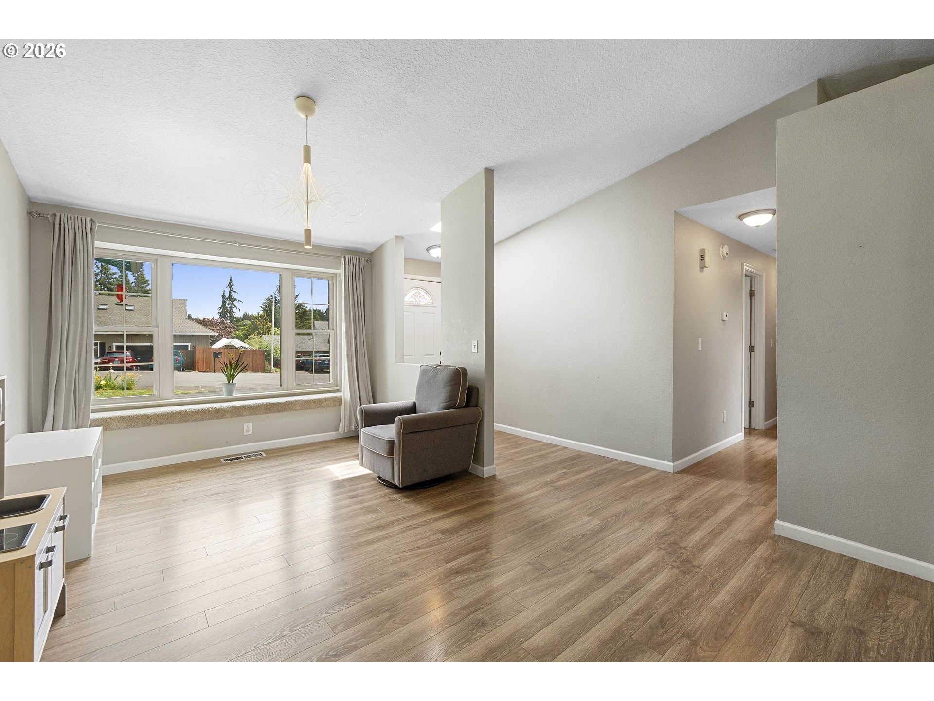 6749 Southwest 174th Place Beaverton, OR 97007 - Photo 6 of 39 a view of an empty room and window