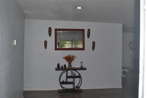 a view of entryway with wooden floor