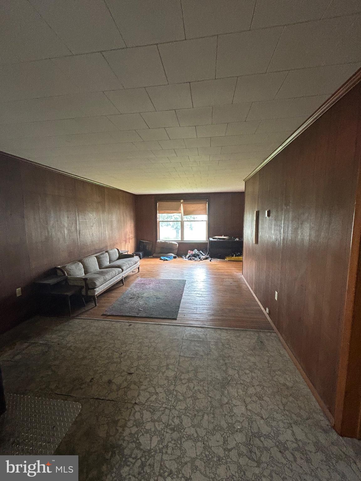 56 Maclay Street Milroy, PA 17063 - Photo 33 of 36 Spacious room with warm wood tones.