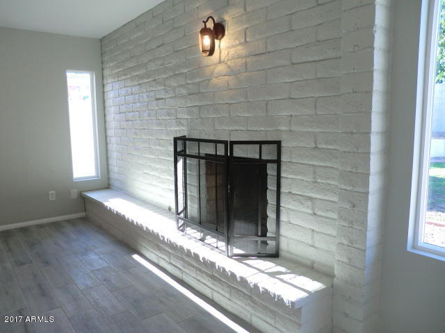4240 West Redfield Road Phoenix, AZ 85053 - Photo 11 of 27 Fireplace