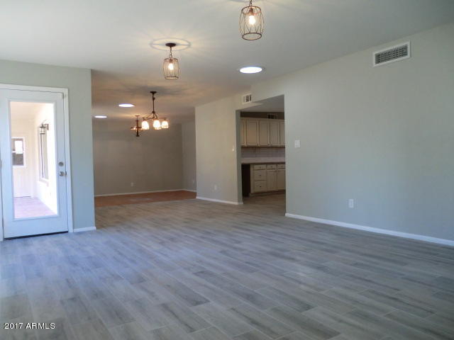 4240 West Redfield Road Phoenix, AZ 85053 - Photo 12 of 27 Family Room to Dining Rooom