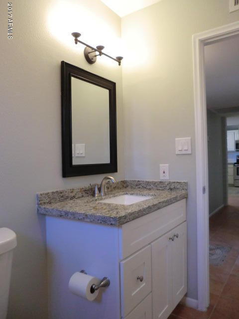 4240 West Redfield Road Phoenix, AZ 85053 - Photo 16 of 27 Granite Vanity at Hall Bath