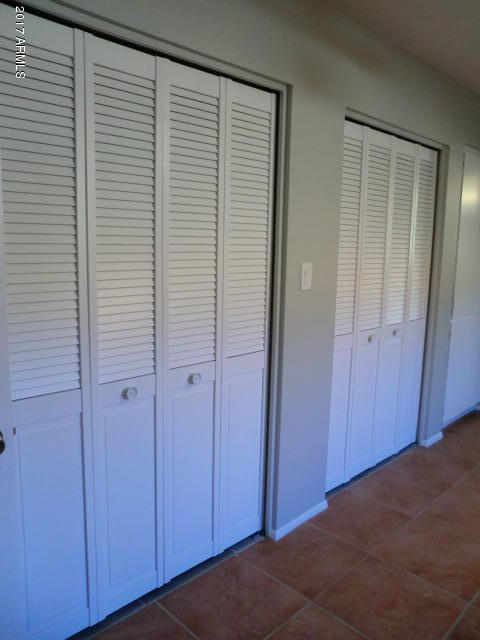 4240 West Redfield Road Phoenix, AZ 85053 - Photo 19 of 27 His/Her Closets at Master