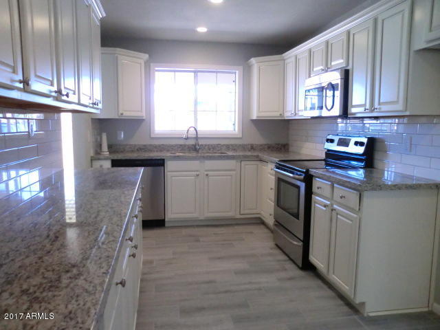 4240 West Redfield Road Phoenix, AZ 85053 - Photo 2 of 27 Long Kitchen Cabinets
