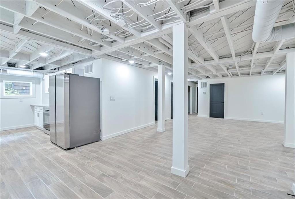 2218 Belvedere Avenue Southwest Atlanta, GA 30311 - Photo 4 of 13 a view of a room with wooden walls
