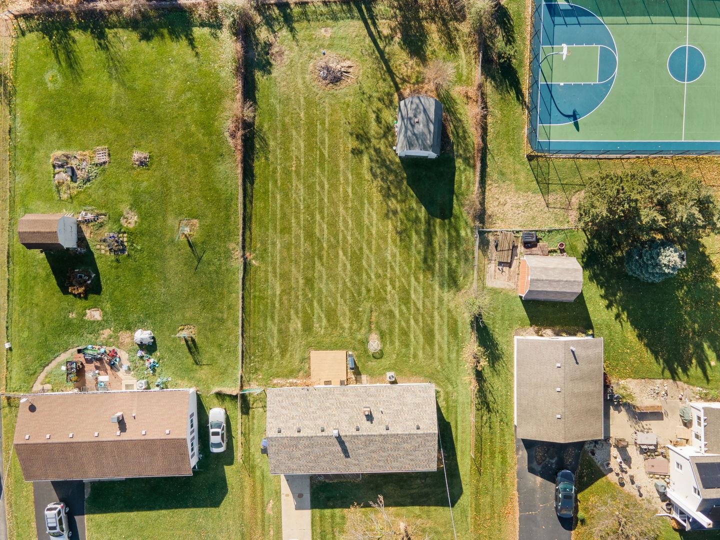 5011-3 Three Oaks Road Crystal Lake, IL 60014 - Photo 13 of 16 an aerial view of a residential apartment building with a yard