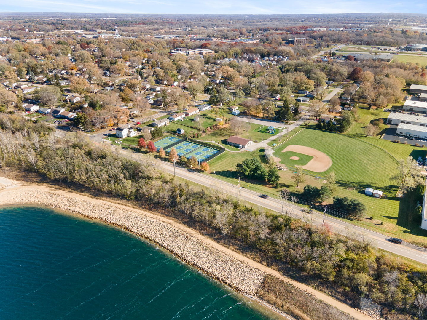 5011-3 Three Oaks Road Crystal Lake, IL 60014 - Photo 15 of 16 an aerial view of a city with lots of residential buildings