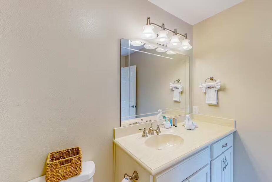 241 Ellis Road, Unit 8 Miramar Beach, FL 32550 - Photo 19 of 29 a bathroom with a sink and a mirror