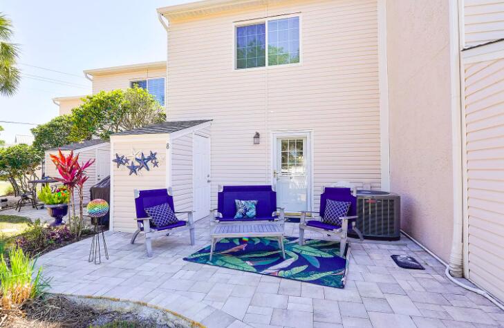 241 Ellis Road, Unit 8 Miramar Beach, FL 32550 - Photo 20 of 29 a view of a chairs in a patio