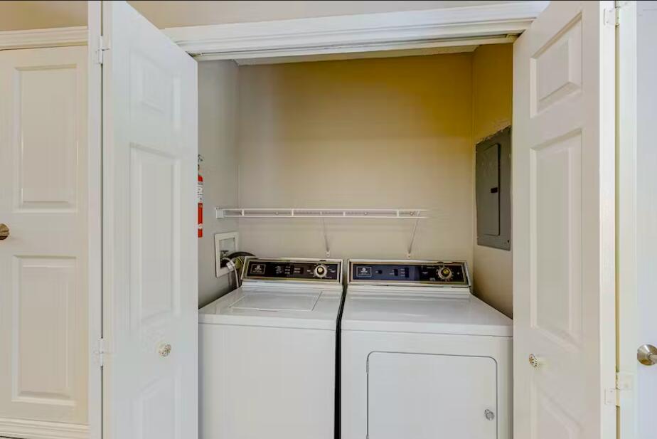 241 Ellis Road, Unit 8 Miramar Beach, FL 32550 - Photo 21 of 29 a utility room with dryer and washer
