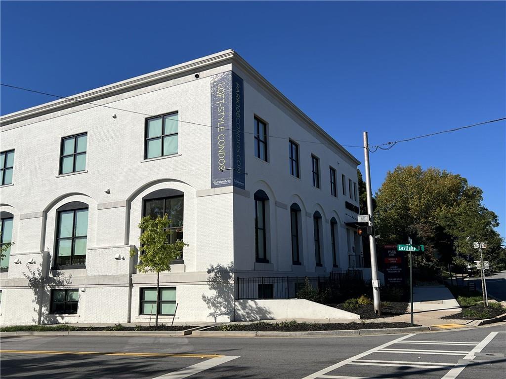 108 Park Place, Unit 311 Decatur, GA 30030 - Photo 2 of 23 a front view of a building with street view