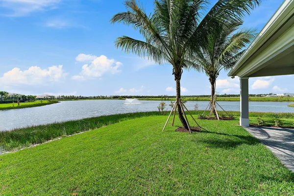 a white bath tub sitting next to a window